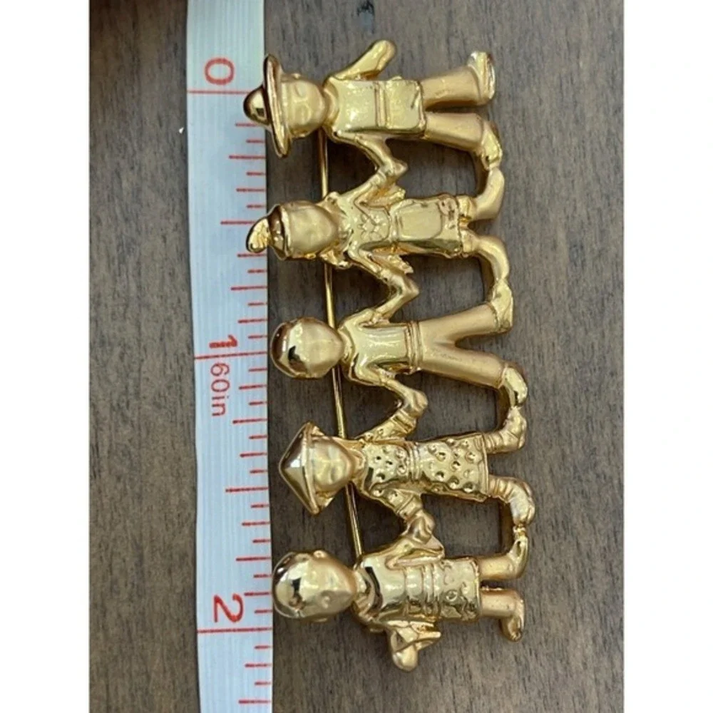 Five Gold-Tone‎ Figures Holding Hands Brooch